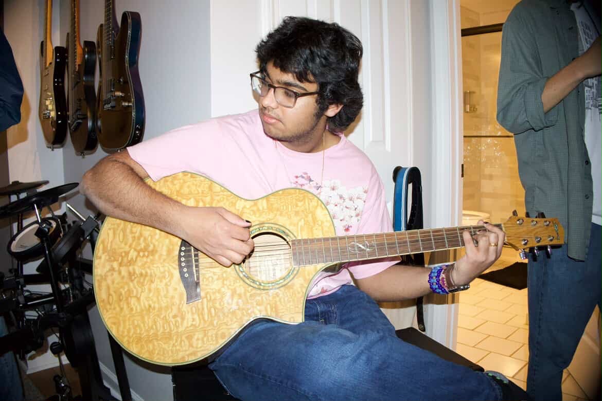 Uddhav 1080 playing guitar